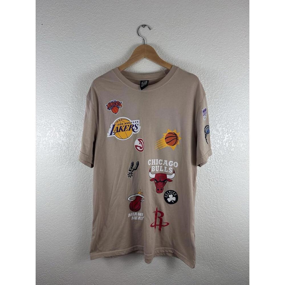 “Ultra Game” NBA All-Over Logo T-Shirt featuring a multi-team